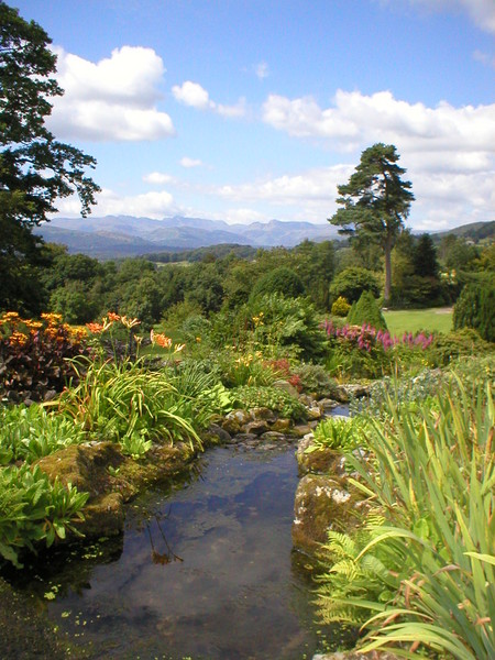 Holehird
                          gardens with the Lakeland Fells behind