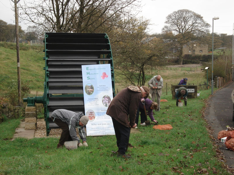 Bulb
                  planting at the Waterwheel on Bury Road